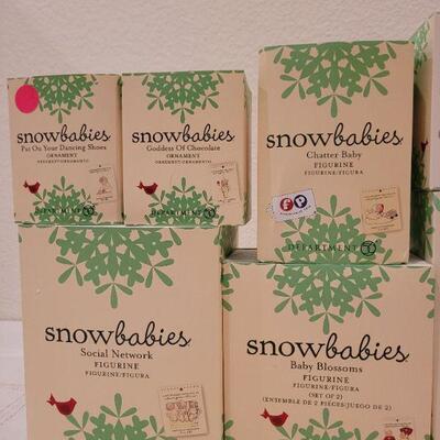 Lot 627: Assorted Dept 56 Snowbabies Christmas Figures 