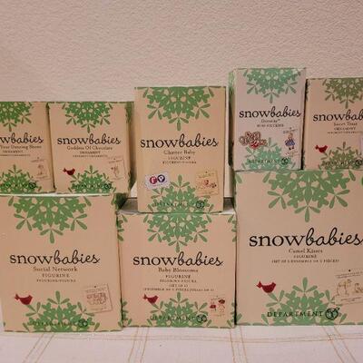 Lot 627: Assorted Dept 56 Snowbabies Christmas Figures 
