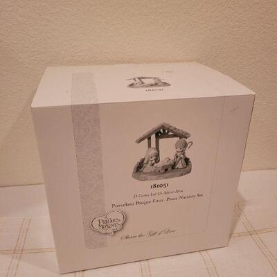 Lot 631: Precious Moments 4 Piece Nativity Set