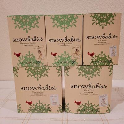 Lot 632: Assorted Dept 56 Snowbabies Christmas Figures 
