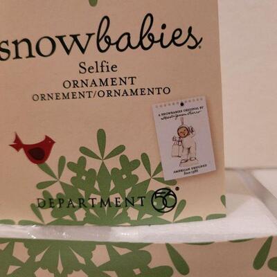 Lot 633: Assorted Dept 56 Snowbabies Christmas Figures 