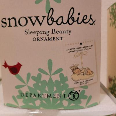 Lot 633: Assorted Dept 56 Snowbabies Christmas Figures 
