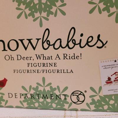 Lot 633: Assorted Dept 56 Snowbabies Christmas Figures 