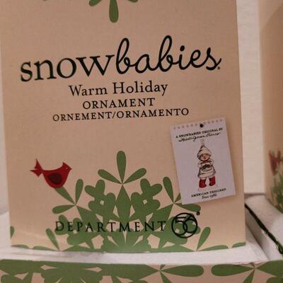 Lot 634: Assorted Dept 56 Snowbabies Christmas Figures 