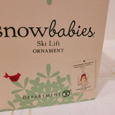Lot 634: Assorted Dept 56 Snowbabies Christmas Figures 