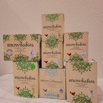 Lot 635: Assorted Dept 56 Snowbabies Christmas Figures 