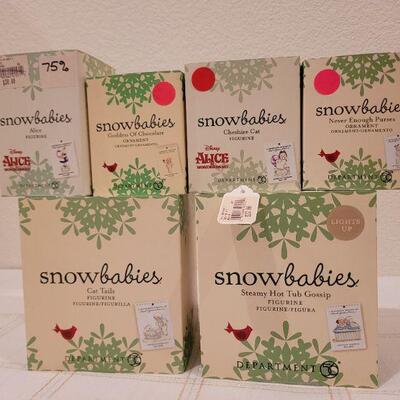 Lot 636: Assorted Dept 56 Snowbabies Christmas Figures 