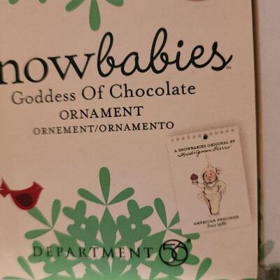 Lot 636: Assorted Dept 56 Snowbabies Christmas Figures 