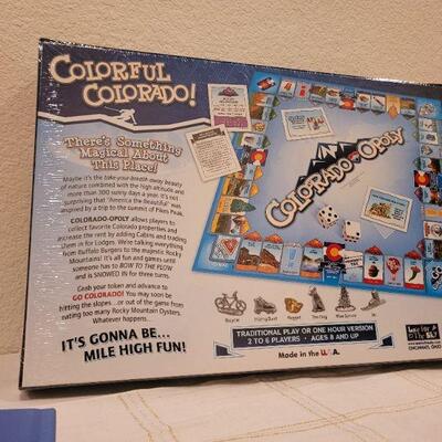 Lot 639: Colorado opoly + Children's Book