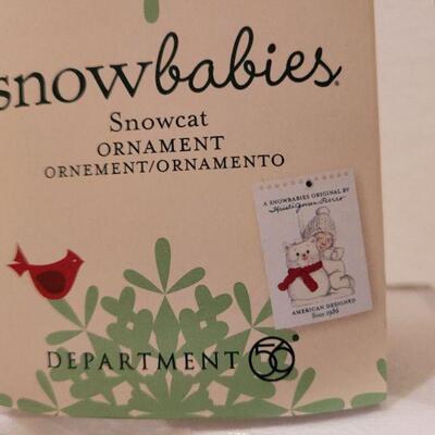 Lot 647: Assorted Dept 56 Snowbabies Christmas Figures 