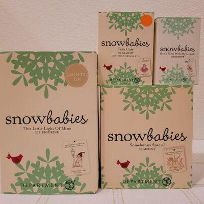 Lot 649: Assorted Dept 56 Snowbabies Christmas Figures 