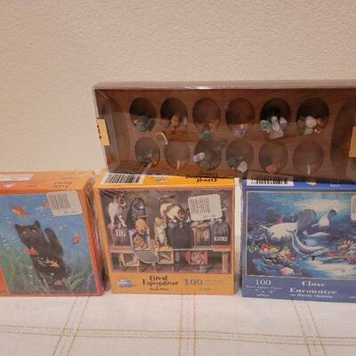 Lot 652: (3) NEW Puzzles + NEW Mancala Game 