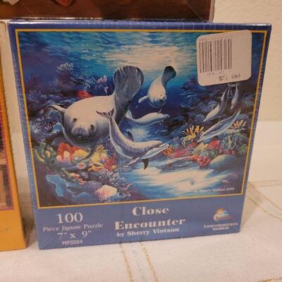 Lot 652: (3) NEW Puzzles + NEW Mancala Game 