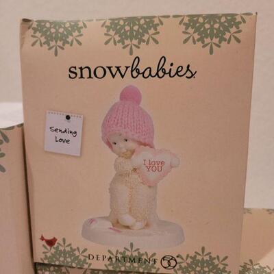 Lot 655: Assorted Dept 56 Snowbabies Christmas Figures 