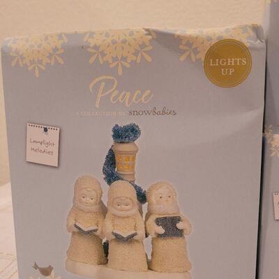 Lot 656: Assorted Dept 56 Snowbabies Christmas Figures 