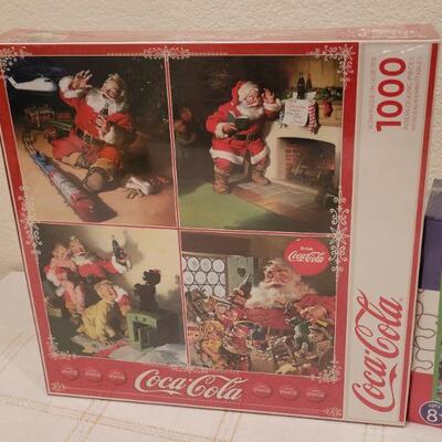 Lot 661: NEW Puzzles Coca Cola 1000 pcs + 200 pc Ocean Scene