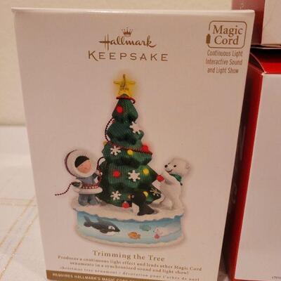 Lot 665: Hallmark MAGIC CORD and Magic Cord Ornaments w/ Slippers 
