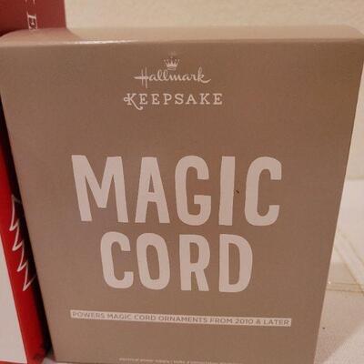 Lot 665: Hallmark MAGIC CORD and Magic Cord Ornaments w/ Slippers 