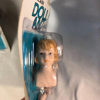 Lot 61 - Porcelain Doll Head and Arms