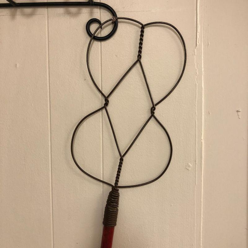 Old rug beater