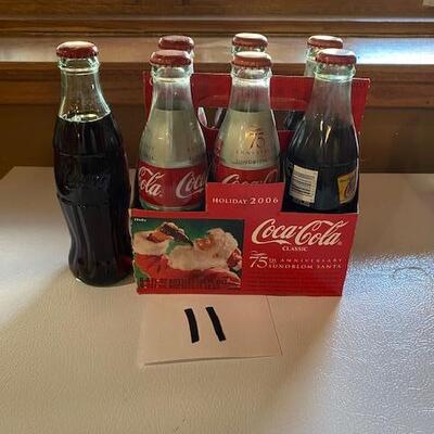 7 Coca Cola bottles