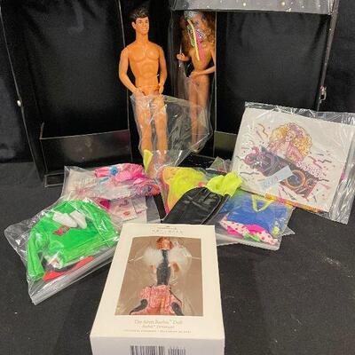 Lot 97 -  Barbie and Ken with Carry Case and Accessories and More!
