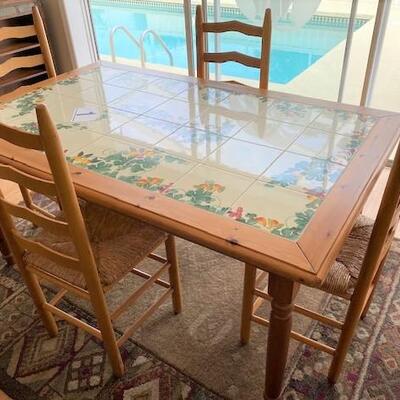 LOT#1LR: Nicola Faiano Grottaglie Italy Tile top Table with 4 Chairs & Area Rug