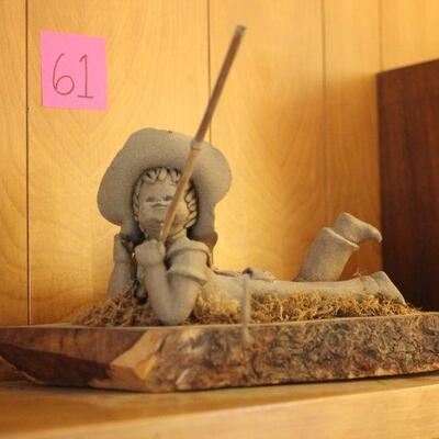 Lot 61 Boy Fishing Sculpture on Log 