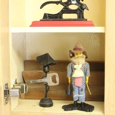 Lot 86 Cast-iron Nutcracker, Doll and Figurine
