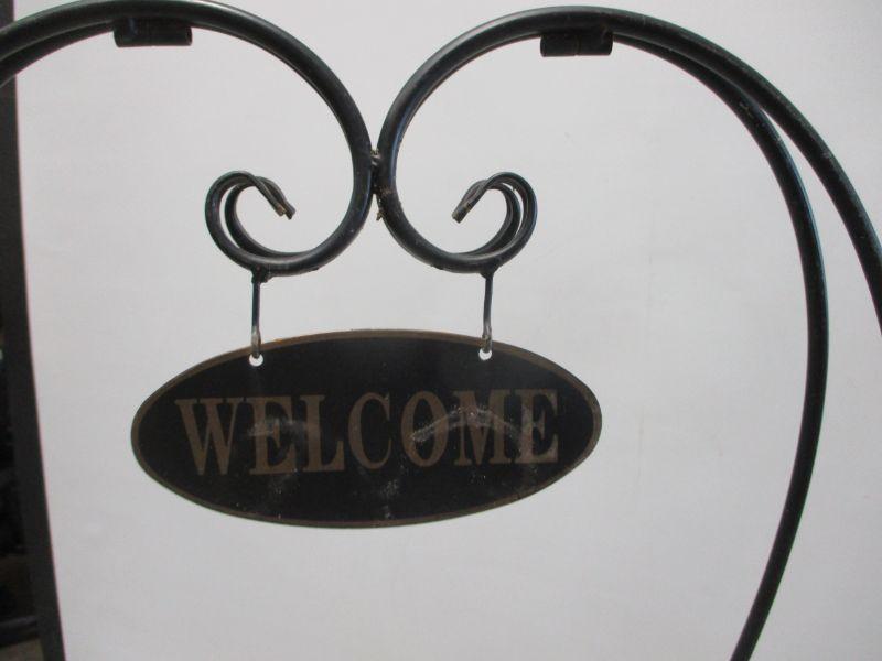 Lot 198 - Metal Welcome Plant Stand | EstateSales.org