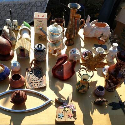 Assorted pottery and decorative home items.