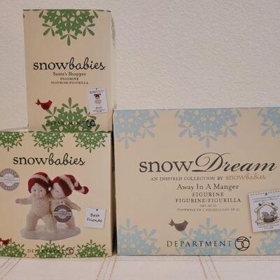 Lot 669: Assorted Dept 56 Snowbabies Figures 