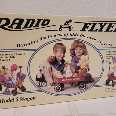 Lot 674: NEW Children Radio Flyer Wagon MODEL 5 and FISHER PRICE Little Riders  