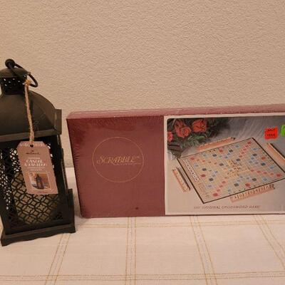 Lot 683: 1971 SCRABBLE New Board Game + HALLMARK Candle Lantern BATTERY POWERED