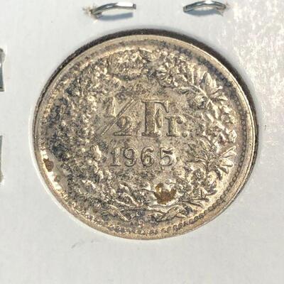 Lot 31 - 1931 British Shilling and 1965 Swiss 1/2 Franc