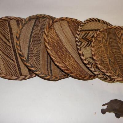 5 hand crafted basket weave place settings.