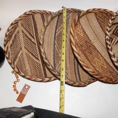 5 hand crafted basket weave place settings.