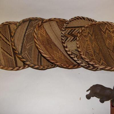 5 hand crafted basket weave place settings.