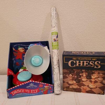 Lot 691: Brand NEW CHESS, Dance with Elf and COLOR your Own Wrapping Paper