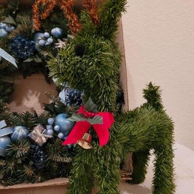 Lot 703: Wreath and Pair of Reindeer Figures