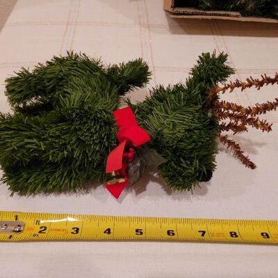 Lot 703: Wreath and Pair of Reindeer Figures