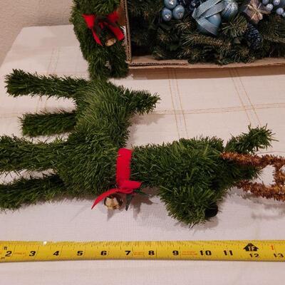 Lot 703: Wreath and Pair of Reindeer Figures