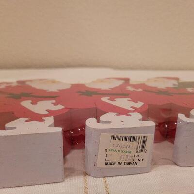 Lot 704: Christmas Treasures Music Box and Santa Claus Puzzle 