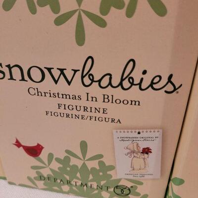 Lot 713: Assorted Dept 56 Snowbabies Christmas Figures 