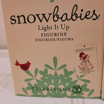 Lot 713: Assorted Dept 56 Snowbabies Christmas Figures 