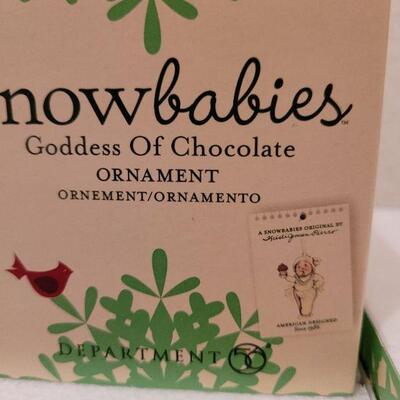 Lot 713: Assorted Dept 56 Snowbabies Christmas Figures 