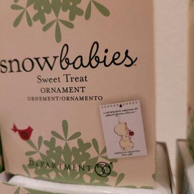 Lot 714: Assorted Dept 56 Snowbabies Christmas Figures 