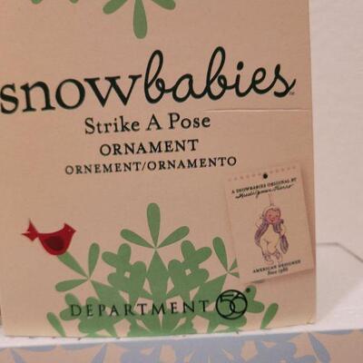 Lot 714: Assorted Dept 56 Snowbabies Christmas Figures 