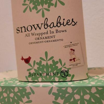 Lot 715: Assorted Dept 56 Snowbabies Christmas Figures 