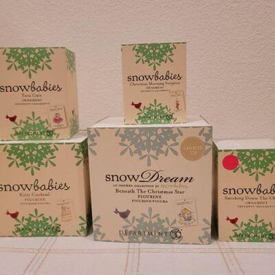 Lot 716: Assorted Dept 56 Snowbabies Christmas Figures 